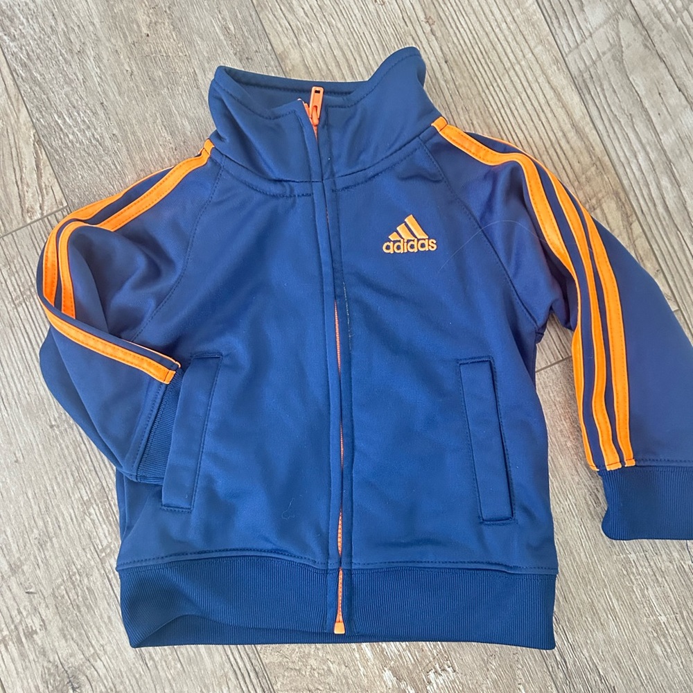 Adidas blue and yellow zip up baby track jacket. Size 12 months.